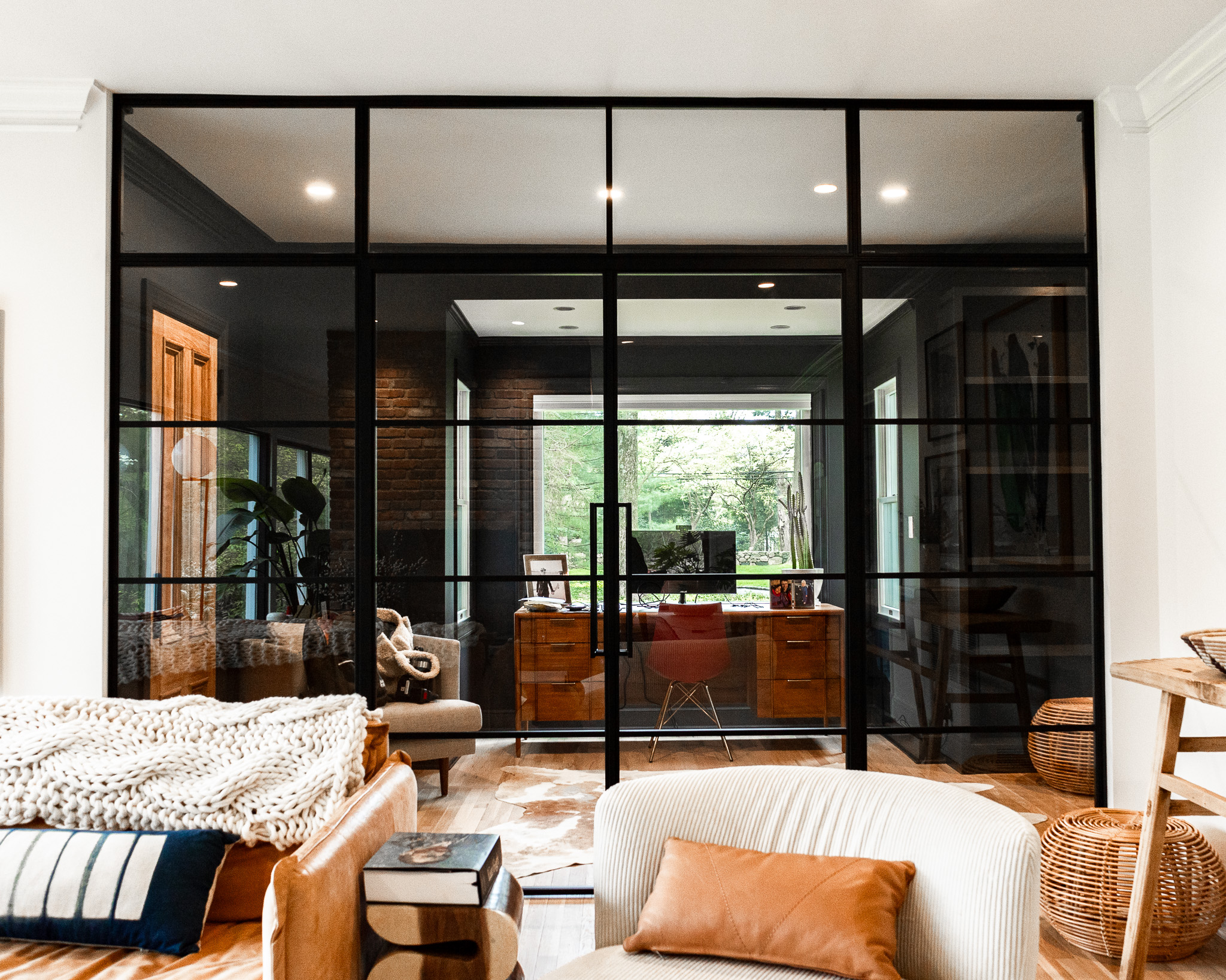 Interior Steel partition dividing a studio from a living room